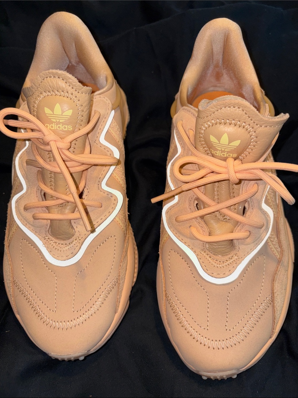 Addias Ozweego Peach/Blush Athletic Sneakers with White Accent